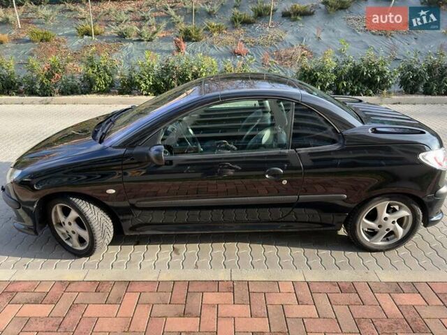 Черный Пежо 206, объемом двигателя 1.59 л и пробегом 231 тыс. км за 3600 $, фото 7 на Automoto.ua