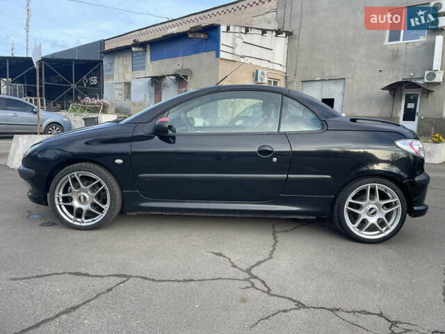 Черный Пежо 206, объемом двигателя 2 л и пробегом 238 тыс. км за 3400 $, фото 3 на Automoto.ua