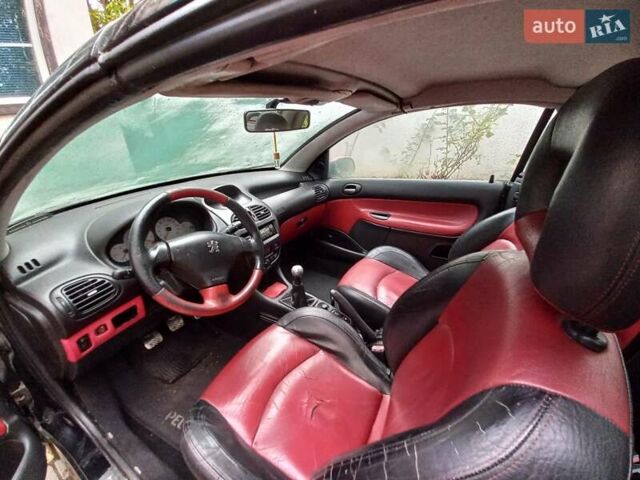 Черный Пежо 206, объемом двигателя 2 л и пробегом 238 тыс. км за 5000 $, фото 10 на Automoto.ua