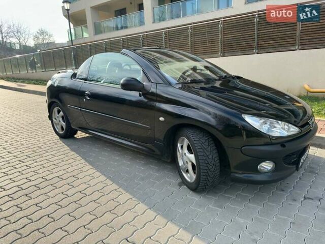 Черный Пежо 206, объемом двигателя 1.59 л и пробегом 231 тыс. км за 3600 $, фото 4 на Automoto.ua