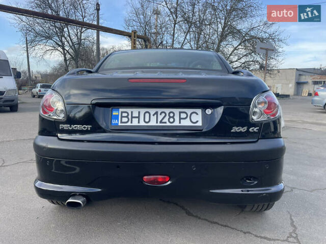 Черный Пежо 206, объемом двигателя 2 л и пробегом 238 тыс. км за 3400 $, фото 4 на Automoto.ua