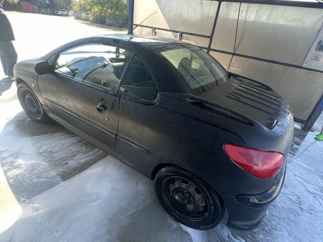 Чорний Пежо 206, об'ємом двигуна 2 л та пробігом 199 тис. км за 1200 $, фото 4 на Automoto.ua