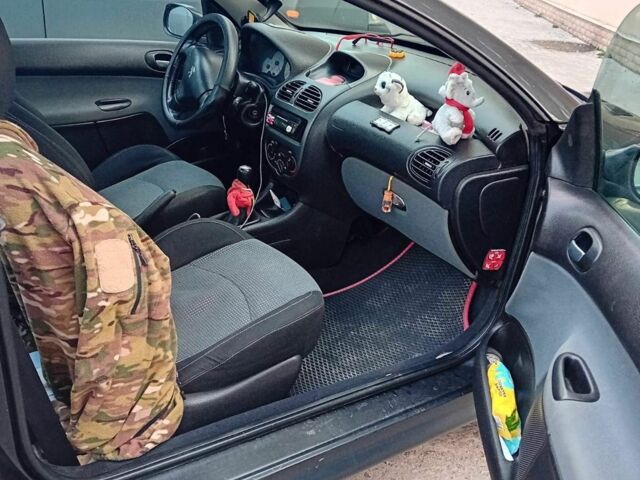 Чорний Пежо 206, об'ємом двигуна 1.6 л та пробігом 250 тис. км за 2700 $, фото 3 на Automoto.ua