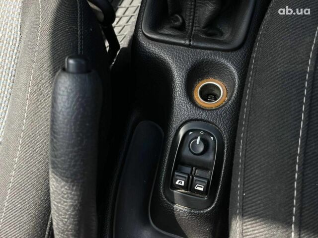 Черный Пежо 206, объемом двигателя 1.6 л и пробегом 134 тыс. км за 3380 $, фото 21 на Automoto.ua