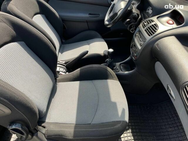 Черный Пежо 206, объемом двигателя 1.6 л и пробегом 134 тыс. км за 3380 $, фото 19 на Automoto.ua