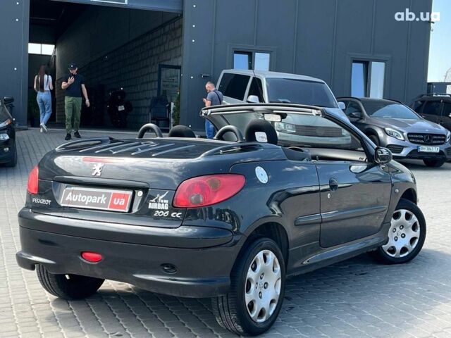 Черный Пежо 206, объемом двигателя 1.6 л и пробегом 134 тыс. км за 3380 $, фото 5 на Automoto.ua