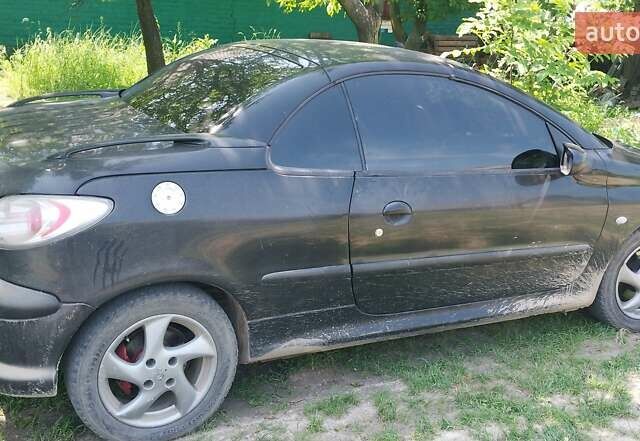 Черный Пежо 206, объемом двигателя 1.6 л и пробегом 150 тыс. км за 3000 $, фото 4 на Automoto.ua