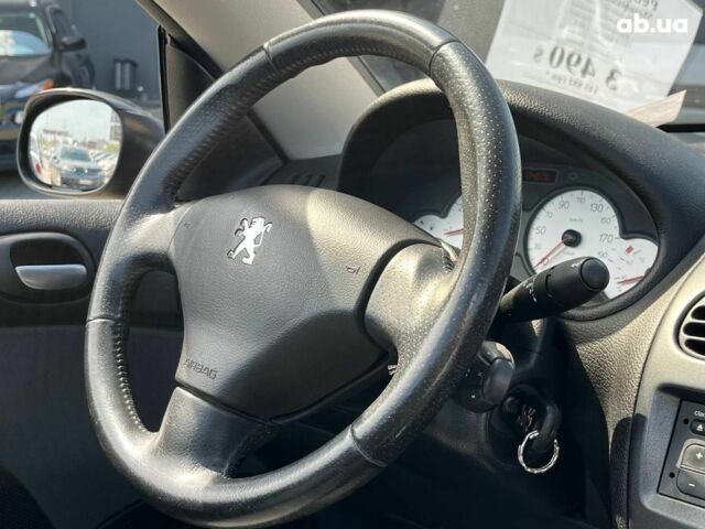 Черный Пежо 206, объемом двигателя 1.6 л и пробегом 134 тыс. км за 3380 $, фото 24 на Automoto.ua