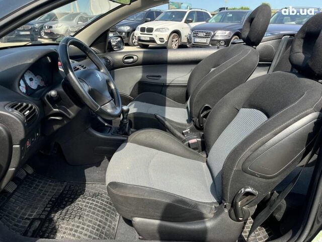 Черный Пежо 206, объемом двигателя 1.6 л и пробегом 134 тыс. км за 3380 $, фото 25 на Automoto.ua