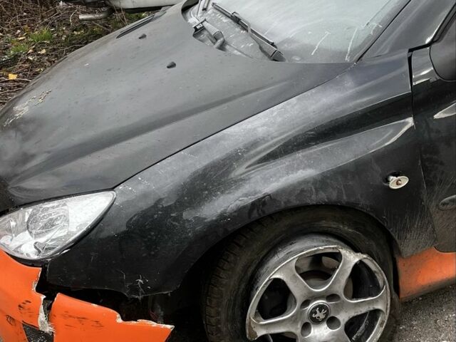 Черный Пежо 206, объемом двигателя 1.6 л и пробегом 226 тыс. км за 1200 $, фото 3 на Automoto.ua