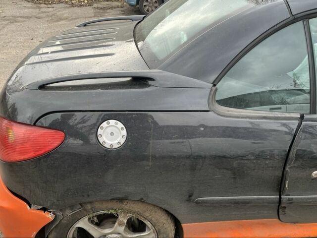 Черный Пежо 206, объемом двигателя 1.6 л и пробегом 226 тыс. км за 1200 $, фото 2 на Automoto.ua