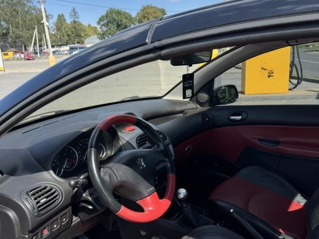 Черный Пежо 206, объемом двигателя 1.6 л и пробегом 175 тыс. км за 4700 $, фото 7 на Automoto.ua