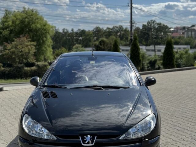 Черный Пежо 206, объемом двигателя 1.6 л и пробегом 175 тыс. км за 4700 $, фото 1 на Automoto.ua