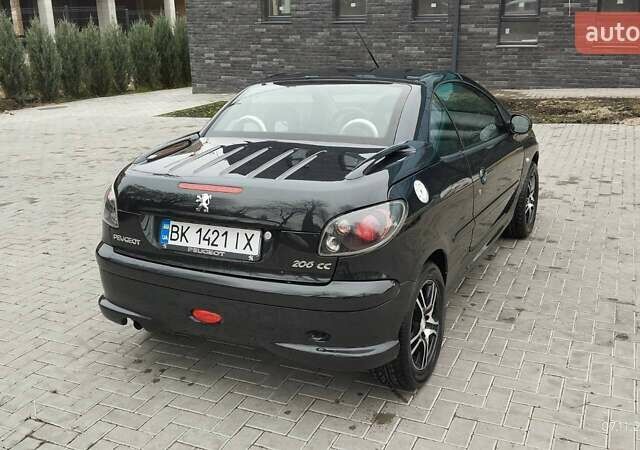Черный Пежо 206, объемом двигателя 1.59 л и пробегом 216 тыс. км за 3800 $, фото 2 на Automoto.ua