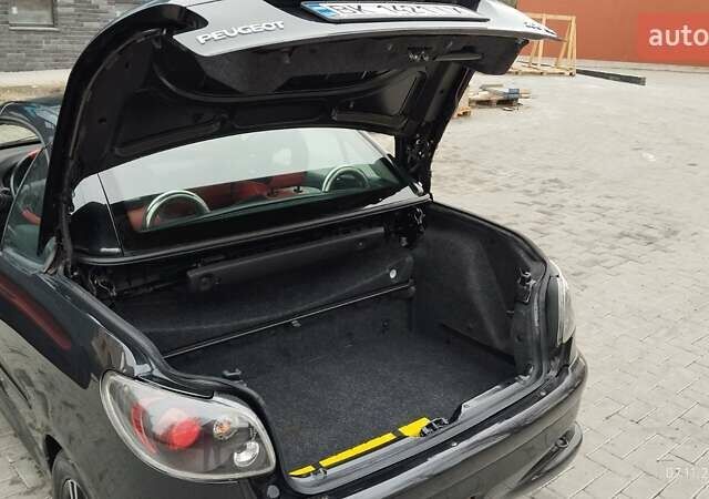 Черный Пежо 206, объемом двигателя 1.59 л и пробегом 216 тыс. км за 3800 $, фото 3 на Automoto.ua