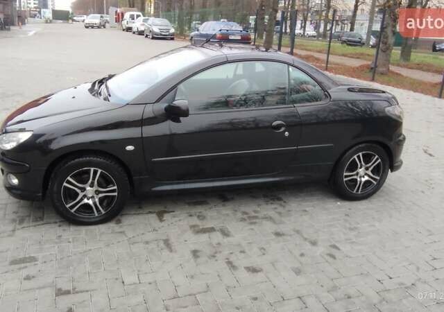 Черный Пежо 206, объемом двигателя 1.59 л и пробегом 216 тыс. км за 3800 $, фото 1 на Automoto.ua