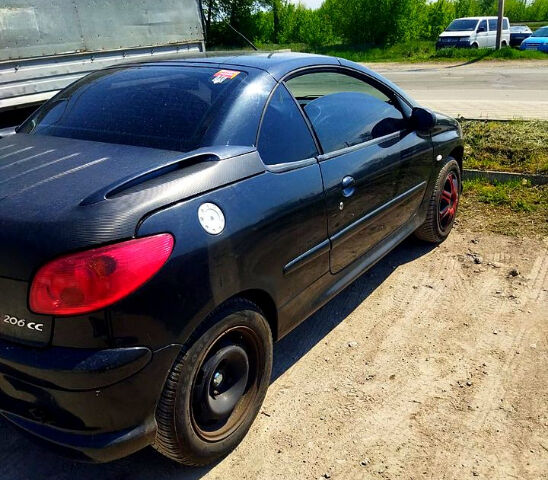 Черный Пежо 206, объемом двигателя 1.6 л и пробегом 236 тыс. км за 2200 $, фото 3 на Automoto.ua