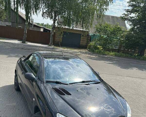 Черный Пежо 206, объемом двигателя 1.6 л и пробегом 110 тыс. км за 4200 $, фото 3 на Automoto.ua