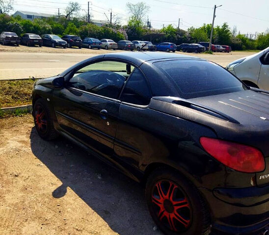 Черный Пежо 206, объемом двигателя 1.6 л и пробегом 236 тыс. км за 2200 $, фото 11 на Automoto.ua