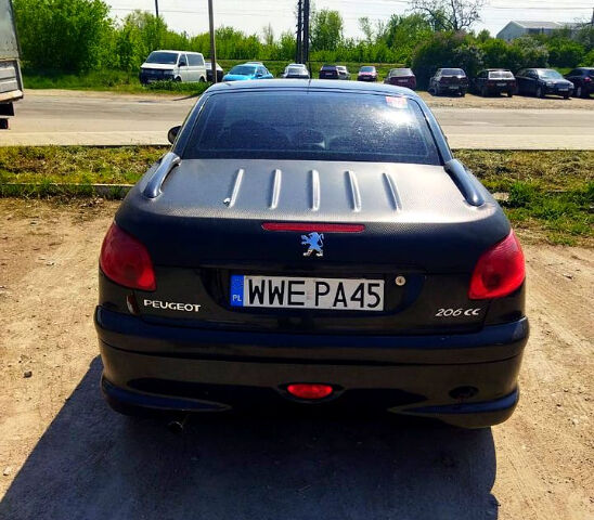 Черный Пежо 206, объемом двигателя 1.6 л и пробегом 236 тыс. км за 2200 $, фото 4 на Automoto.ua