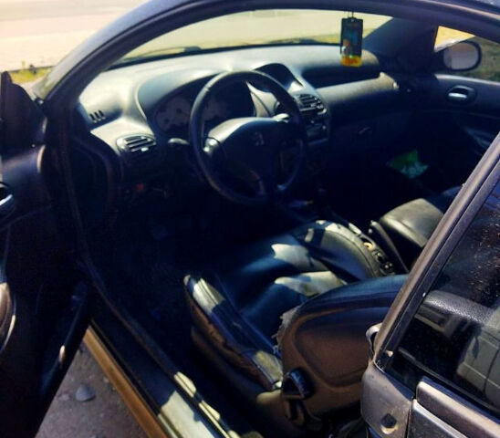 Черный Пежо 206, объемом двигателя 1.6 л и пробегом 236 тыс. км за 2200 $, фото 7 на Automoto.ua