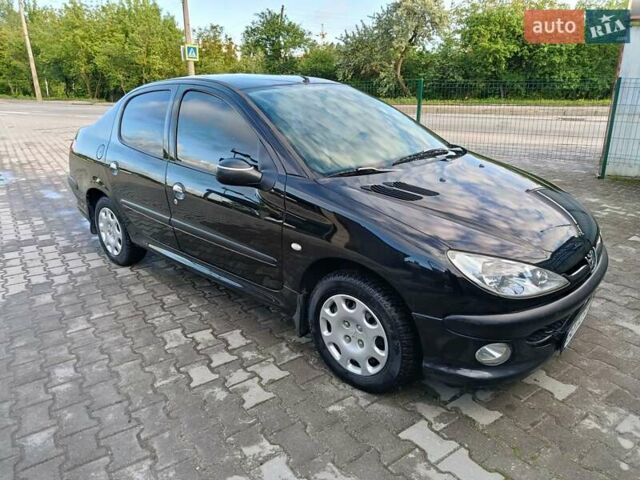 Черный Пежо 206, объемом двигателя 1.36 л и пробегом 167 тыс. км за 3200 $, фото 9 на Automoto.ua