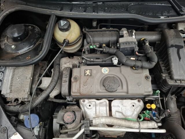 Черный Пежо 206, объемом двигателя 1.4 л и пробегом 151 тыс. км за 3900 $, фото 4 на Automoto.ua