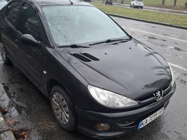 Черный Пежо 206, объемом двигателя 1.4 л и пробегом 151 тыс. км за 3900 $, фото 6 на Automoto.ua