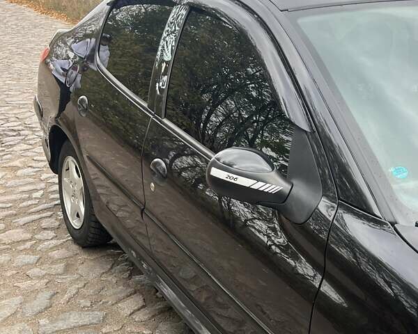 Пежо 206 2008 в Никополе на Automoto.ua Черный Пежо 206, объемом двигателя 1.36 л и пробегом 139 тыс. км за 4300 $, фото 11 на Automoto.ua