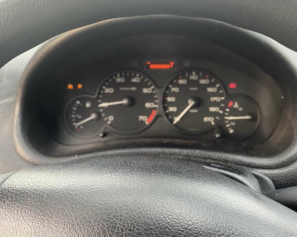 Черный Пежо 206, объемом двигателя 1.4 л и пробегом 148 тыс. км за 2100 $, фото 10 на Automoto.ua