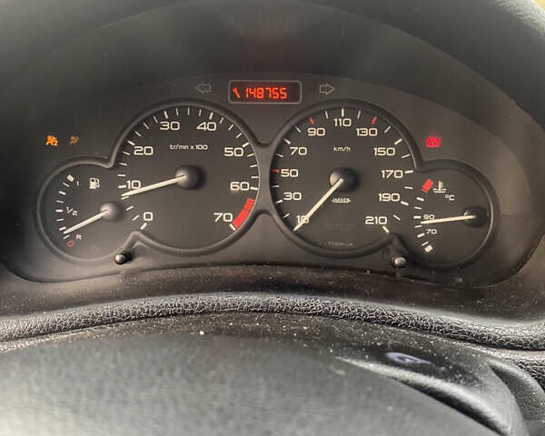 Черный Пежо 206, объемом двигателя 1.4 л и пробегом 148 тыс. км за 2100 $, фото 12 на Automoto.ua