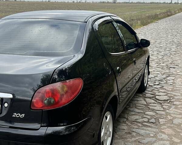 Пежо 206 2008 в Никополе на Automoto.ua Черный Пежо 206, объемом двигателя 1.36 л и пробегом 139 тыс. км за 4300 $, фото 10 на Automoto.ua