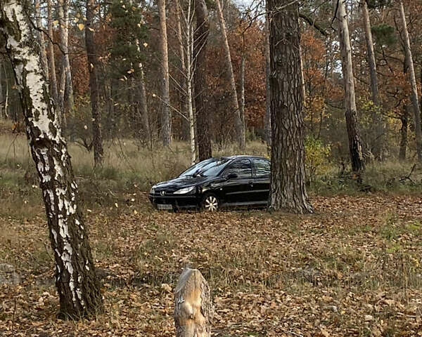 Черный Пежо 206, объемом двигателя 1.4 л и пробегом 148 тыс. км за 2100 $, фото 9 на Automoto.ua