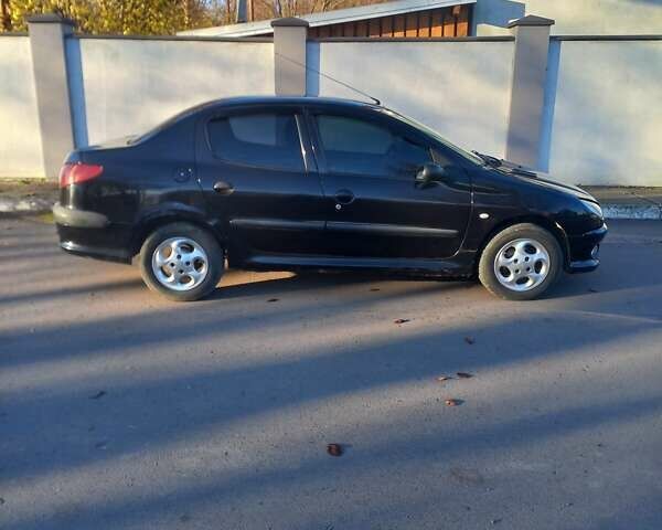 Пежо 206 2009 в Дрогобыче на Automoto.ua Черный Пежо 206, объемом двигателя 1.36 л и пробегом 270 тыс. км за 1900 $, фото 4 на Automoto.ua