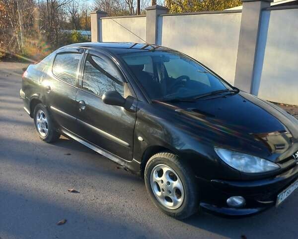 Чорний Пежо 206, об'ємом двигуна 1.36 л та пробігом 270 тис. км за 1700 $, фото 7 на Automoto.ua