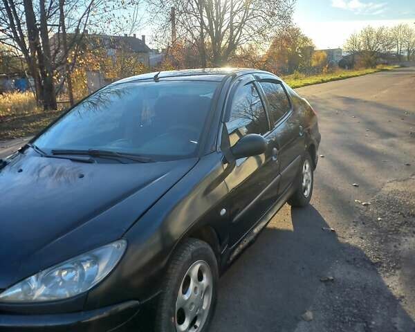 Чорний Пежо 206, об'ємом двигуна 1.36 л та пробігом 270 тис. км за 1700 $, фото 8 на Automoto.ua