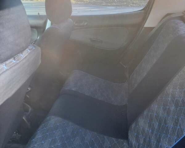 Чорний Пежо 206, об'ємом двигуна 1.36 л та пробігом 270 тис. км за 1700 $, фото 2 на Automoto.ua
