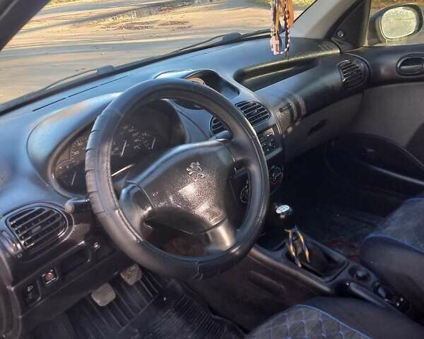 Пежо 206 2009 в Дрогобыче на Automoto.ua Черный Пежо 206, объемом двигателя 1.36 л и пробегом 270 тыс. км за 1900 $, фото 9 на Automoto.ua