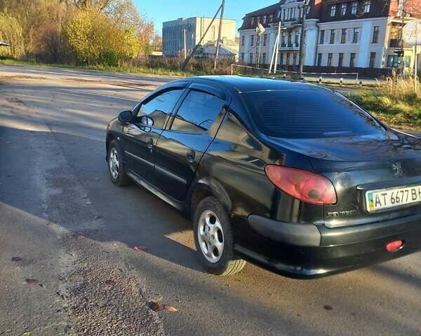 Пежо 206 2009 в Дрогобыче на Automoto.ua Черный Пежо 206, объемом двигателя 1.36 л и пробегом 270 тыс. км за 1900 $, фото 1 на Automoto.ua