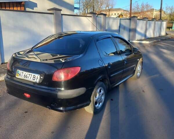 Чорний Пежо 206, об'ємом двигуна 1.36 л та пробігом 270 тис. км за 1700 $, фото 5 на Automoto.ua