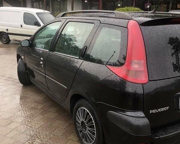 Чорний Пежо 206, об'ємом двигуна 1.12 л та пробігом 147 тис. км за 2700 $, фото 6 на Automoto.ua