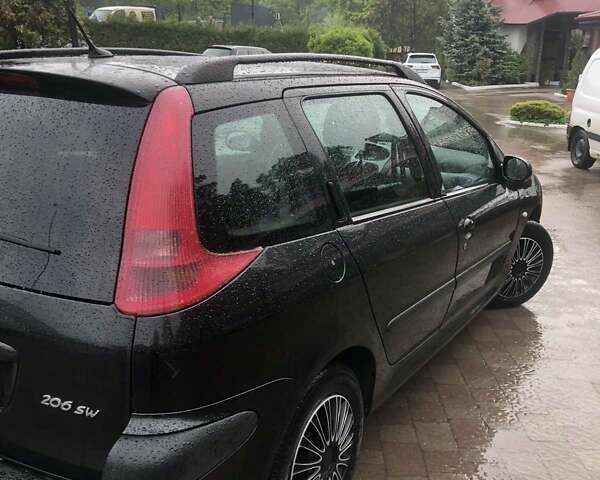 Чорний Пежо 206, об'ємом двигуна 1.12 л та пробігом 147 тис. км за 2700 $, фото 3 на Automoto.ua