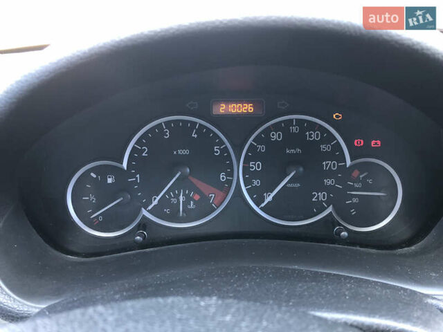 Черный Пежо 206, объемом двигателя 1.36 л и пробегом 210 тыс. км за 3400 $, фото 7 на Automoto.ua