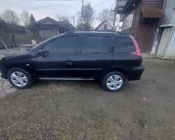 Черный Пежо 206, объемом двигателя 1.4 л и пробегом 298 тыс. км за 2896 $, фото 3 на Automoto.ua