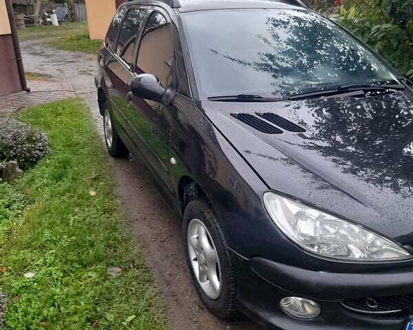 Черный Пежо 206, объемом двигателя 1.4 л и пробегом 286 тыс. км за 3160 $, фото 9 на Automoto.ua