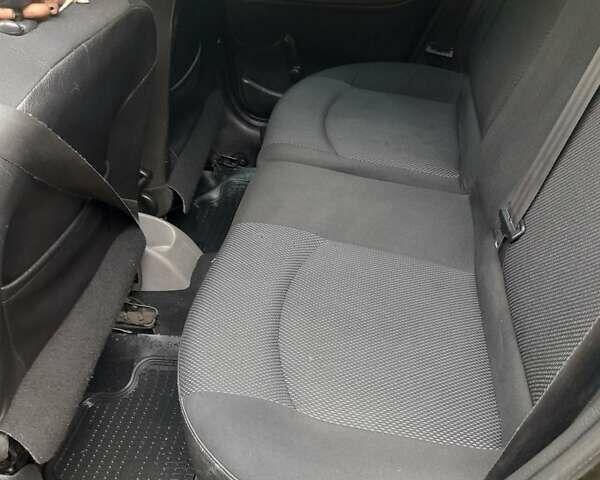 Черный Пежо 206, объемом двигателя 1.4 л и пробегом 286 тыс. км за 3160 $, фото 6 на Automoto.ua