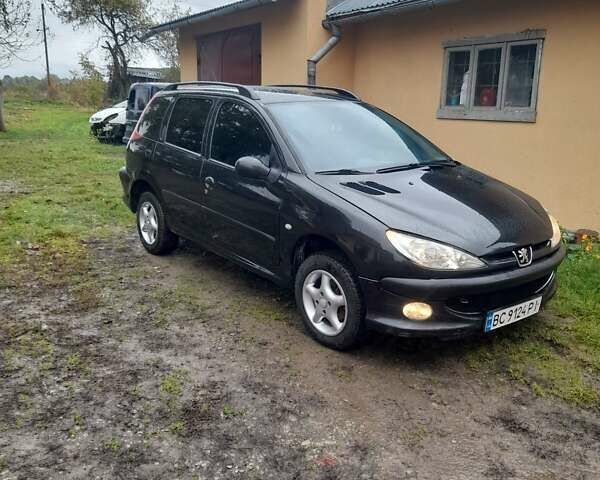 Черный Пежо 206, объемом двигателя 1.4 л и пробегом 298 тыс. км за 2896 $, фото 8 на Automoto.ua