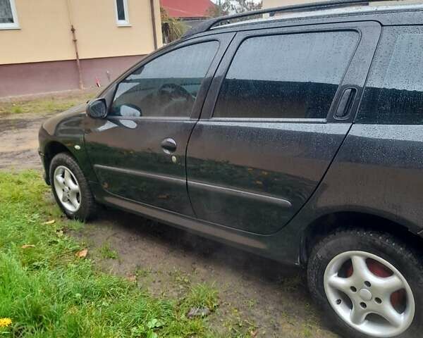 Черный Пежо 206, объемом двигателя 1.4 л и пробегом 286 тыс. км за 3160 $, фото 15 на Automoto.ua