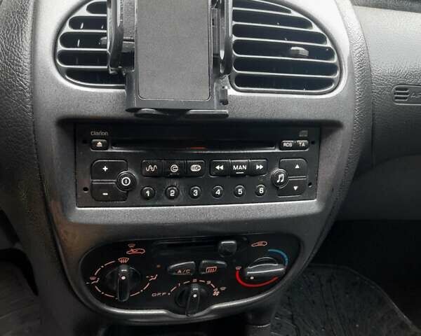 Черный Пежо 206, объемом двигателя 1.4 л и пробегом 298 тыс. км за 2896 $, фото 13 на Automoto.ua