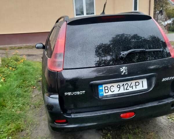 Черный Пежо 206, объемом двигателя 1.4 л и пробегом 286 тыс. км за 3160 $, фото 11 на Automoto.ua